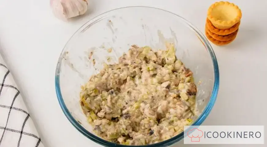 Tartlets with sprats and cream cheese