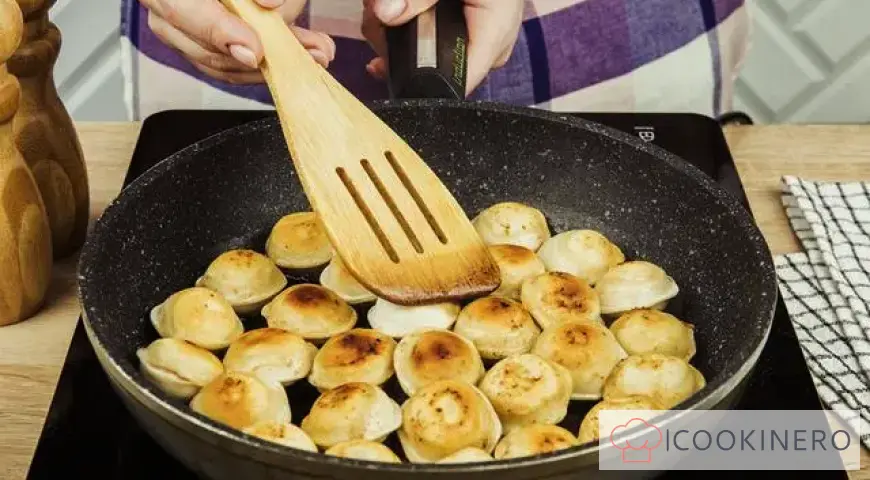 Fried dumplings with adjika and sour cream