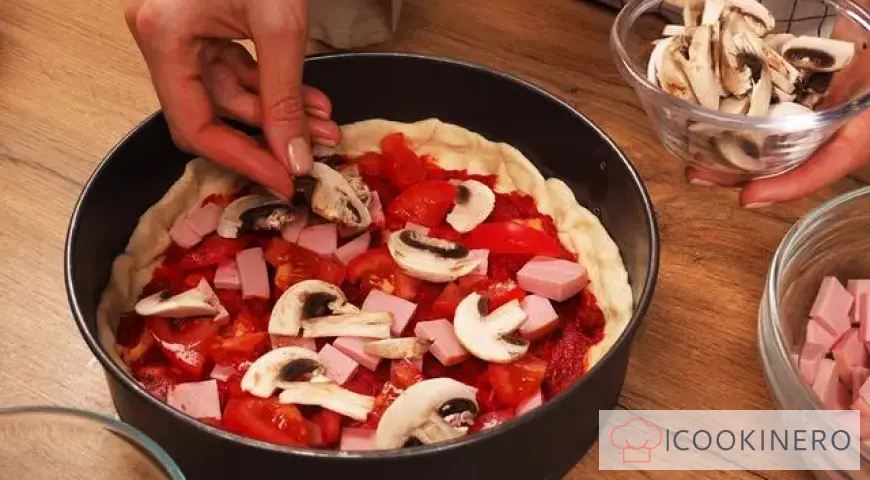 Pizza with mushrooms and sausage