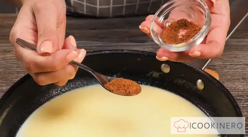 Spinach in a creamy sauce with parmesan for garnish