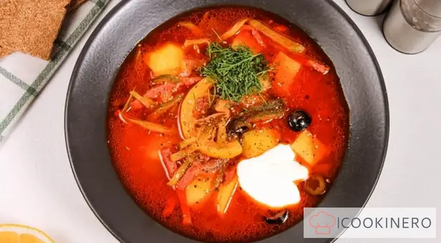 Solyanka with potatoes and sausage