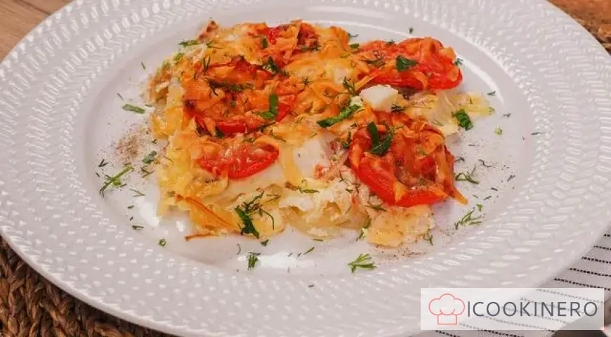 Pollock with tomatoes in the oven