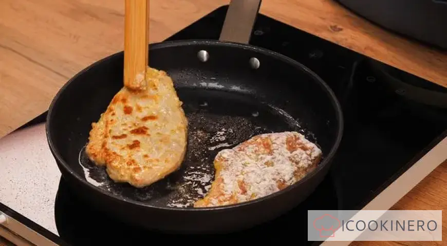 Chicken cutlets in a frying pan