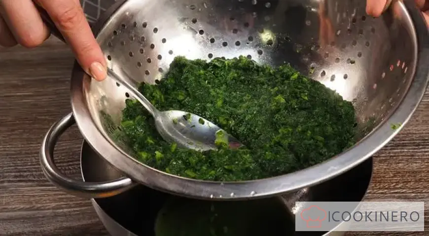 Spinach in a creamy sauce with parmesan for garnish