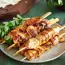 Chicken skewers marinated in beer and honey