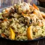 Pilaf with chicken in a cauldron