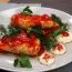 Rollitos de col en salsa de tomate