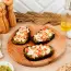 Bruschetta with black bread and pesto
