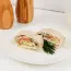Roll with salmon, processed cheese and cucumber