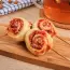 Puff pastry curls on a stick