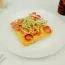 Cazuela de patatas con salchichas