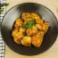 Fried dumplings with adjika and sour cream