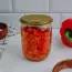 Pickled peppers with carrots in jars