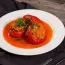 Peppers stuffed with meat in a saucepan