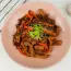 Maiale con tagliatelle