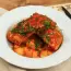 Ribs with potatoes in a saucepan
