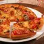 Pizza with mushrooms and sausage