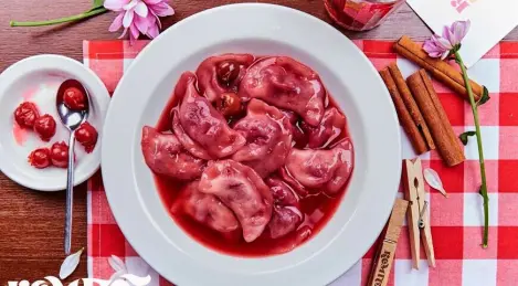 Vareniki with cherries boiled in compote