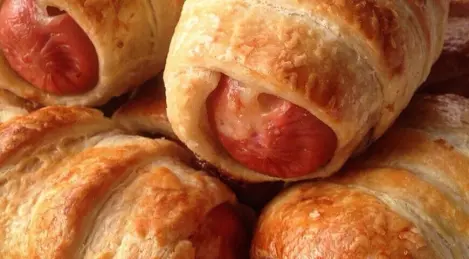 Sausages with cheese in dough