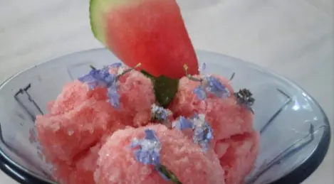 Watermelon sorbet with sugar forget-me-nots