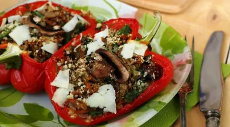 Bell peppers stuffed with mushrooms, vegetables and quinoa