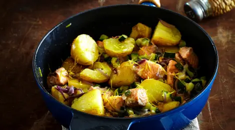 Ragout of new potatoes with salmon and zucchini