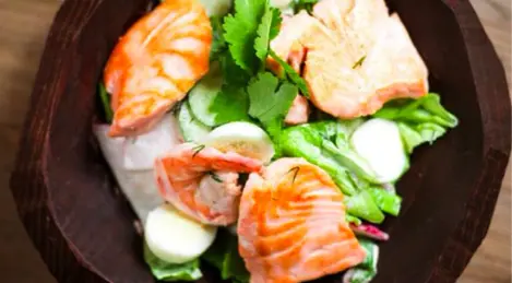 Summer salad with sour cream and salmon