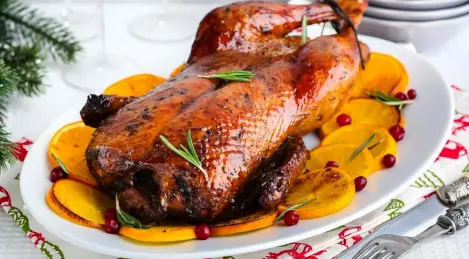 Duck in pomegranate and rum glaze