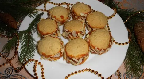 Cookies with boiled condensed milk and almond petals