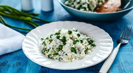 Rice with green onions, peas and cumin