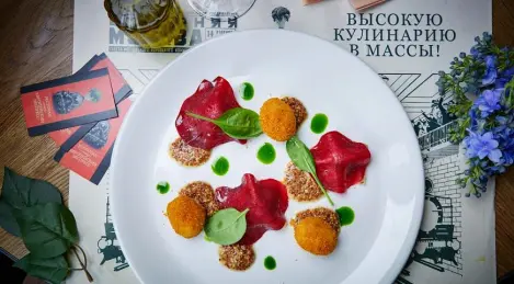 Baked parsnip in beetroot with young potatoes and parsley