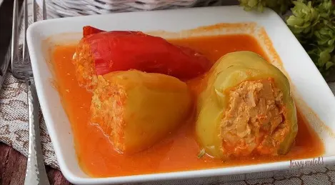 Peppers stuffed with meat and rice in a saucepan