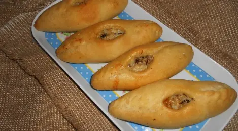 Pies with mackerel and rice