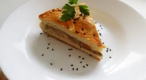 Pie with chicken, forest mushrooms and vegetables