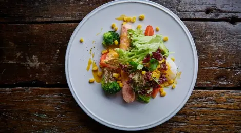 Crab sausage with hollandaise sauce and poached egg