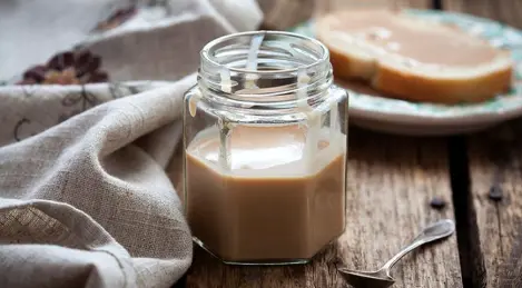 Homemade condensed milk with coffee and cocoa