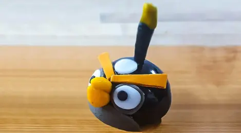 Angry Birds blackcurrant mousse with pomegranate jelly and Japanese biscuit