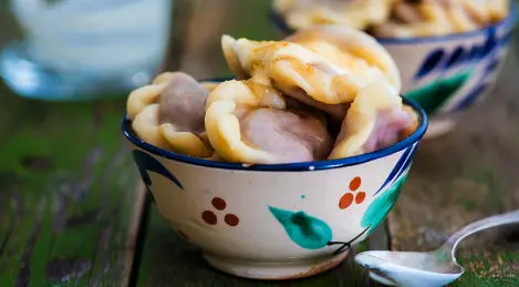 Vareniki with cherries and strawberries