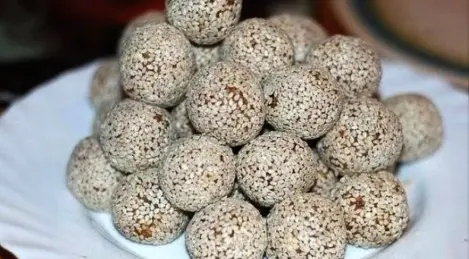 Sweets with raisins, orange peel and honey