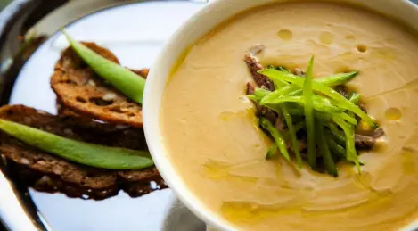 Creamy chickpea soup with duck breast