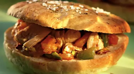 Focaccia buns stuffed with chicken, vegetables and pistachios