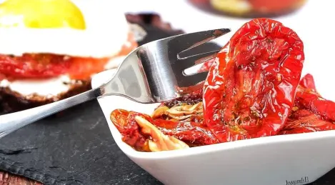 Dried tomatoes in the dryer