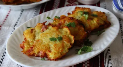 Potato pancakes with bacon and ham