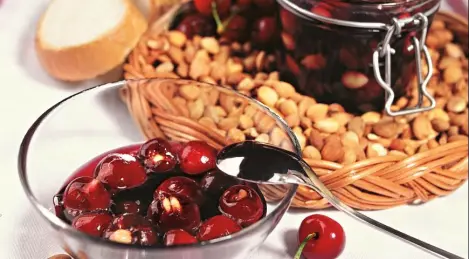 Cherry jam with apricot kernels