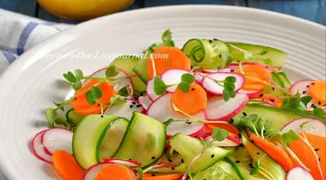 Vegetable salad with radish, cucumber and carrots