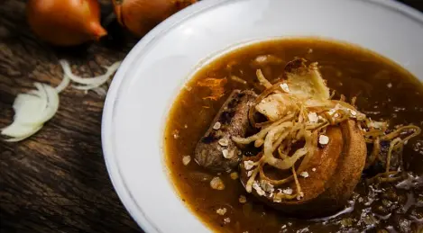 Onion soup with duck kebab