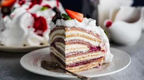 Crepe cake with curd cream and berries