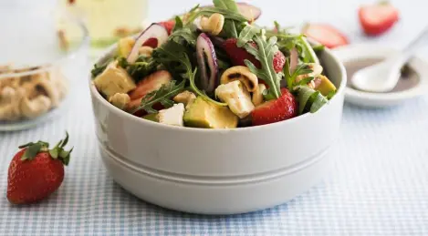 Salad with strawberries, avocado and arugula
