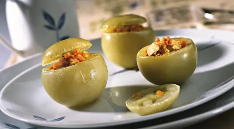 Salted tomatoes stuffed with chicken fillet