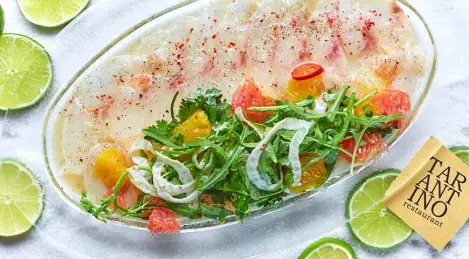 Lubina con salsa cítrica, granada e hinojo